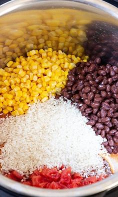 beans, rice and corn in a pot on the stove