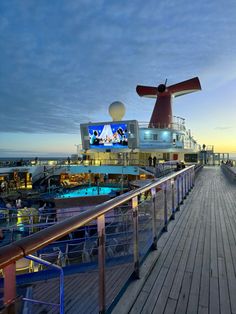 the deck of a cruise ship at dusk