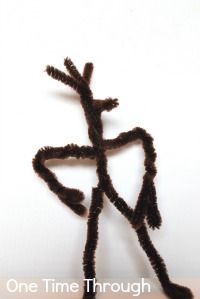 a cross made out of yarn with the words one time through jesus written on it