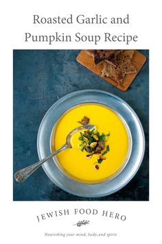 the cover of roasted garlic and pumpkin soup recipe, featuring a bowl of soup with bread on