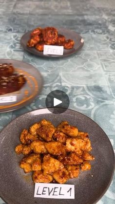 several plates with food on them sitting on a table