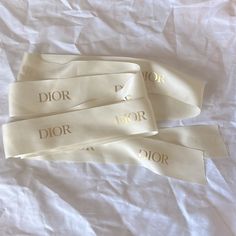 All Orders Ship Next Business Day! Authentic Dior Gift Wrapping Ribbon This Is 100% Authentic - Check Out My Luxury Handbag Tiktok: @Lizherrling Condition: Brand New/No Holes/No Stains/No Pilling/No Fade Color Is White Size Length 122 In Width 2 In Measurements Are Approximate Perfect For Gift Wrapping Happy To Include This For Free With A Purchase Of Any Of My Luxury Handbags Smoke Free Home! Offers Welcome Dior Gift, Wrapping Ribbon, Elegant Gift Wrapping, Gold Holiday, Dior Accessories, Holiday Colors, Fade Color, Luxury Handbags, Dior