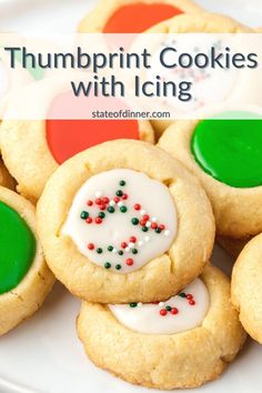 some cookies with icing on a white plate