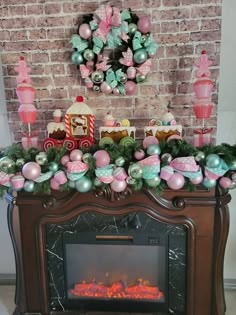 a fireplace decorated with pink and green ornaments