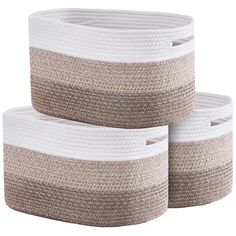 three white and beige baskets stacked on top of each other