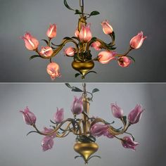 two chandeliers with pink flowers hanging from them