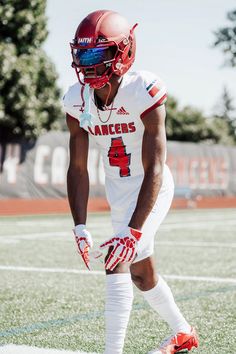 a football player in uniform on the field