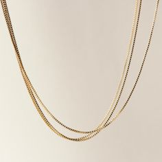 DETAILS • Single Chain Necklace• 18k Gold Filled• Tarnish Resistant• Length: 18" with 1" extender• Chain Width: 1mm GOLD FILLED •Our Gold filled jewelry has an outer layer of 14k or 18k gold that is pressure bonded to a base metal of jewelers brass. •This type of jewelry is made for everyday use of stacking or layering. • This type of jewelry can withstand normal body sweat, body oils, and is typically water resistant. •However, these jewels should be removed before swimming, exercising, or heav Delicate Box Chain Necklace For Everyday, Dainty Charm Necklace With Box Chain, Delicate Everyday Box Chain Necklace, Dainty Box Chain Link Necklace, Minimalist Layered Necklace With Delicate Chain Links, Minimalist Layered Necklace With Delicate Chain, Dainty Box Chain Necklace, Minimalist Chain Necklace With Adjustable Chain And Square Pendant, Dainty Box Chain Jewelry For Layering