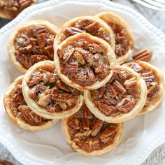 small pecan pies on a white plate