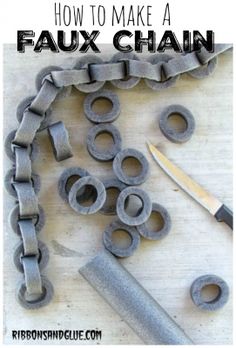 an image of some metal parts on a table with a pair of scissors and a knife