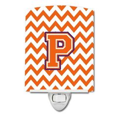 an orange and white chevrone pattern with the letter p on it's side