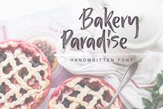 the words bakery paradise written on top of two pies