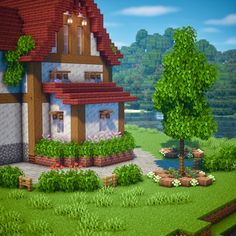 a small house in the middle of a lush green field with trees and flowers around it