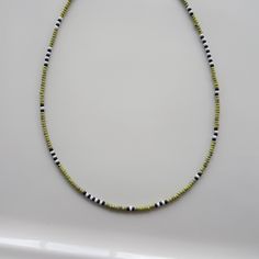 Green miyuki beads, black miyuki beads, and white miyuki beads are used in this Mens Beaded Necklace. Each Beaded Choker consists of 2.8mm - 3mm i.e. 8/0 beads. I used all Surfer Necklace, Mens Beaded Jewelry stainless steel wire and silver plated lobster claw. mens jewelrymen giftsmens necklacebest man giftsfor himboyfriend necklacenecklaces for menbeaded jewelrysurfer necklacebeaded chokerbohemian necklacehandmade necklacesmens beaded necklace Black And Silver Beaded Necklace, Bead Necklace For Men, Men Beaded Necklace Ideas, Black Heishi Beads For Beach, Black Heishi Beaded Necklaces, Black Beaded Necklace With Letter Beads, Black Beaded Necklace With Letter And Round Beads, Minimalist Beaded Necklace With Letter Beads, Minimalist Beaded Necklace With Round Letter Beads