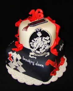 a cake that has been decorated with red ribbon