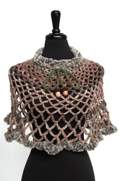 "A fun crochet capelet with a gradient pattern and soft faux fur trim. Throw this capelet on and easily imagine yourself in a magical woodland.  I crocheted it from acrylic yarn and embellished with cord ties and wooden acorns. Measurements: Neck to bottom -  approx.17\" (43cm) More capelets and cowls here - https://www.etsy.com/shop/KnitsomeStudio?section_id=10514179 and here - https://www.etsy.com/shop/KnitsomeStudio?ref=section_id=25373486 Don't forget to check out my other items! There are m Crochet Capelet, Ren Faire Costume, Cord Ties, Fur Trim, Shawls And Wraps, Knit Patterns, Acrylic Yarn, Scarf Wrap, Faux Fur