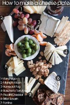 an assortment of cheeses, crackers and nuts on a slate platter with instructions