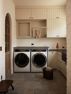 a washer and dryer in a small room