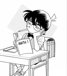 an anime character sitting at a desk reading a book with the word math on it