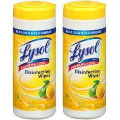 two bottles of lysol disinfecting wipes on a white background