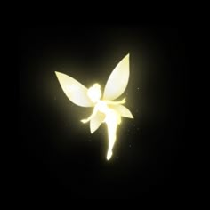 a glowing flower in the dark with light shining on it's petals and leaves