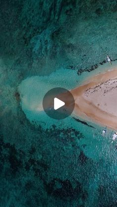 an aerial view of the beach and water