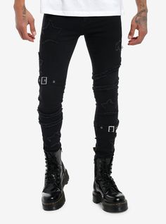 We love the subtle star detail on these stinger jeans. They're black with frayed star patches and seams across the leg  with grommet buckles around each leg at different heights.62 12% cotton; 32 12% polyester; 3% other fibersRise: 9"Inseam: 29 12"Leg opening: 5"ImportedListed in men'sunisex sizesModel is 6'1"Model wears size 30W x 32L Star Jeans Black, Gothic Rivets Bottoms For Streetwear, Hot Topic Mens Outfits, Goth Ripped Jeans, Hot Topic Skull Pants, Stinger, Hot Topic, Visual Kei, Goth Fashion