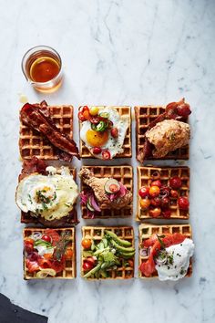 several waffles with different types of food on them