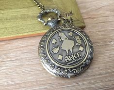 Alice In Wonderland Crafts, Alice In Wonderland Alice, Childrens Christmas Gifts, Alice In Wonderland Gifts, Alice In Wonderland Aesthetic, Wonderland Alice, Hourglasses, Bronze Necklace, Childrens Christmas