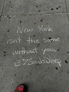 someone wrote this message on the sidewalk in front of their house to say it is new york isn't the same without you