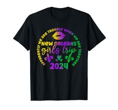 a black t - shirt with the words new orleans girls trip on it