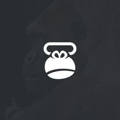 a monkey with a phone on its head is shown in this logo designed for an appliance