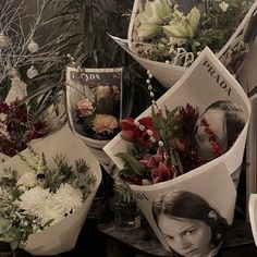 a bunch of flowers that are sitting on a table