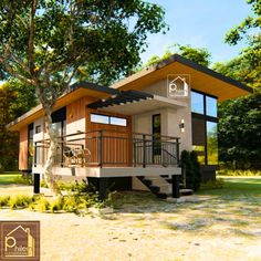 the small house is built on stilts and has stairs leading up to it's second floor