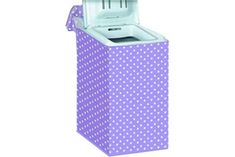 a purple and white polka dot tissue dispenser