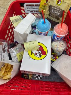 a shopping cart filled with food and condiments