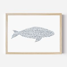 a framed print of a fish with words written in the shape of it's head