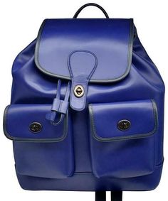 Coach Heritage C2902 Indigo Midnight Leather Backpack NWT $598 100% authentic New with tag! MSRP: $598.00 * Product Details Refined calf leather Inside zip, cell phone and multifunction pockets Drawstring and turnlock closures, fabric lining Top handle with 2 1/2" drop Outside turnlock pockets Adjustable shoulder straps 12 1/2" (L) x 14 1/4" (H) x 5 1/2" (W) Style No. C2902 Exterior has a couple minor scratches during the storage as shown in the photos. No major defect. Please feel free to let u Designer Leather Backpack With Removable Pouch For Travel, Designer Backpack For On-the-go, Classic Coach Backpack For School, Luxury Leather Backpack For School With Adjustable Strap, Coach Backpack With Removable Pouch For School, Designer Leather School Bag, Designer Leather Backpack For Travel, Designer Leather Satchel Backpack, Coach Leather Backpack For On-the-go