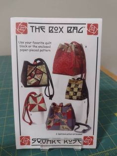 the box bag book is open to show it's many different designs and colors