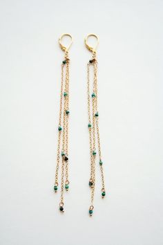 ★★★Graze those shoulders with petite turquoise gemstones. Flirty and whispery, these earrings are a fashion accessory. + Turquoise. 14K Gold Fill Lever Back Ear Wire. 14K Gold Fill Chain. + Length: Pick between 5 inches (shown in picture) and 3 inches.+ Earrings are ready to ship.+ Your earrings will come in a jewelry box, tied with a ribbon.➤➤ Have a question about this product, reach out to me here ➙ https://www.etsy.com/conversations/new?with_id=9057464&referring_id=5772224&referring_ Elegant Turquoise Earrings With Dangling Beads, Diy Earrings Dangle, Boho Wedding Earrings, Shoulder Duster Earrings, Duster Earrings, Amazon River, Long Gold Earrings, Greenwich Ct, Mother Of Pearl Earrings