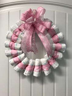 I created this baby girl diaper wreath using size 1 diapers. They are rolled up and zip tied to a wire wreath frame. So diapers can be removed and used when you are through with the wreath. The diameter is approximately 19 inches.  I create my wreaths in a clean smoke free environment. I ship out promptly. I also have this wreath in blue. I do custom orders too. Diaper Wreath Diy, Diaper Wreath, Wire Wreath Frame, Wreath Frame, Wire Wreath, Baby Shower Diapers, Future Family, Frame Wreath