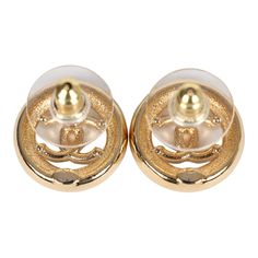 These Chanel CC round stud earrings feature a gold tone round cut-out detail stud earring with white enamel trim accented with mini gold tone CC's and one large black enamel CC logo in the center with post back closures.Origin: ItalyCondition: New and never wornAccompanied by: Chanel box, jewelry box, carebook, retail UPCMeasurements: 0.6" x 0.6" Formal Gold Clip-on Earrings With Black Enamel, Classic Enamel Earrings For Formal Occasions, Classic Formal Enamel Earrings, Gold Formal Earrings With Gold-tone Logo, Classic Gold Enamel Earrings, Classic Gold-tone Round Clip-on Earrings, Elegant Round Jewelry With Gold-tone Hardware, Elegant Jewelry With Gold-tone Hardware, Classic Round Gold-tone Clip-on Earrings