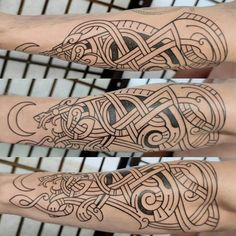 three different tattoos on the arms and legs, each with an intricate design in black ink