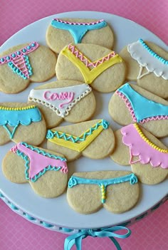 cookies decorated with swimsuits and panties on a plate