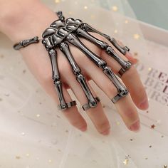 Gender:Men's,Women's; Types:Hand Bracelet with Ring,Halloween Props; Holiday:Carnival,Halloween; Style:Halloween; Material:Metal; Age Group:Adults'; Characters:Skull; Listing Date:08/15/2023 Skeleton Hand Bracelet, Hand Bracelet With Ring, Skeleton Finger, Skeleton Bracelet, Christmas Gift Hampers, Finger Bracelets, Bones Bracelet, Halloween Bracelet, Edgy Jewelry