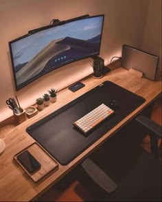 a computer desk with a keyboard, mouse and monitor sitting on it's side