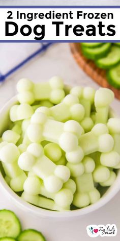 two ingredient frozen dog treats in a white bowl with cucumbers on the side