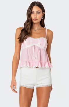 This Lace Trim Babydoll tank top by Edikted is the perfect way to add some sweetness to any outfit. Whether you pair it with its matching shorts or your favorite jeans, you'll feel super cute no matter what.Tank topAdjustable strapsBabydoll fitLace trimRibbon detailingRuffled hemPolyester, RayonModel wears size SModel height is 5'9Item care: Machine wash at maximum 30ºC, do not bleach, do not tumble dry, iron at a maximum of 110ºC, do not dry clean. Edikted Womens Lace Trim Babydoll Tank Top - P Babydoll Tank Top, 2024 Wishlist, Lace Trim Tank Top, Babydoll Tank, Babydoll Style, Swimwear Dress, Babydoll Top, Lace Tank Top, Pink Tank Top