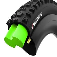 an image of a green tire with the word vittoria on it's side