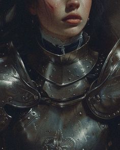 a close up of a person wearing armor